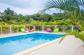 Maison charmante Le Moule avec piscine partagée